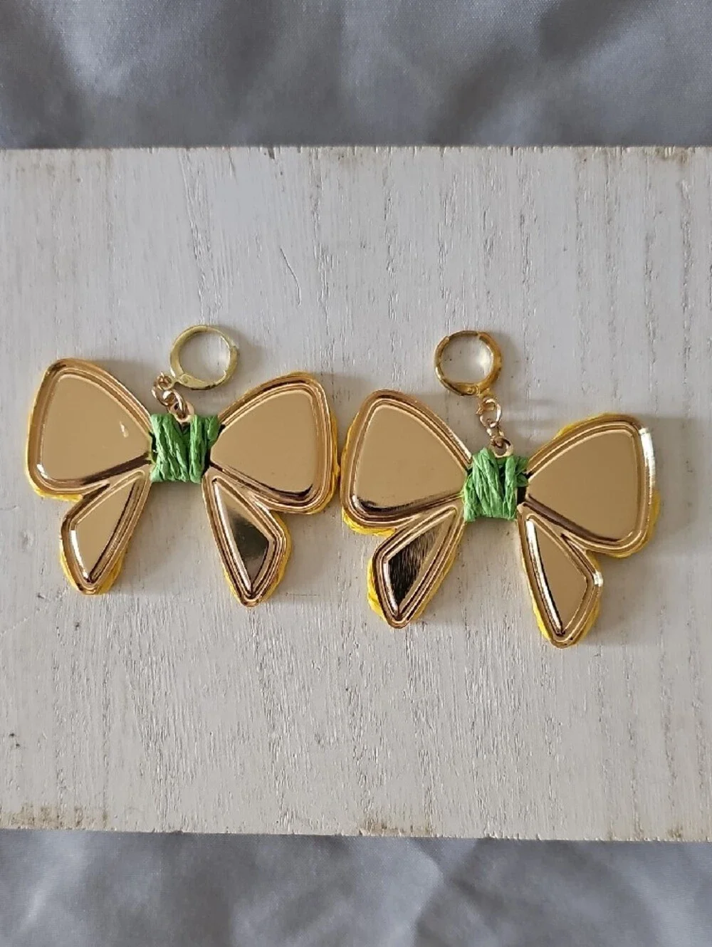 Yellow Bow Drop Earrings with Green Accent